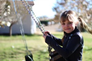 child on swing